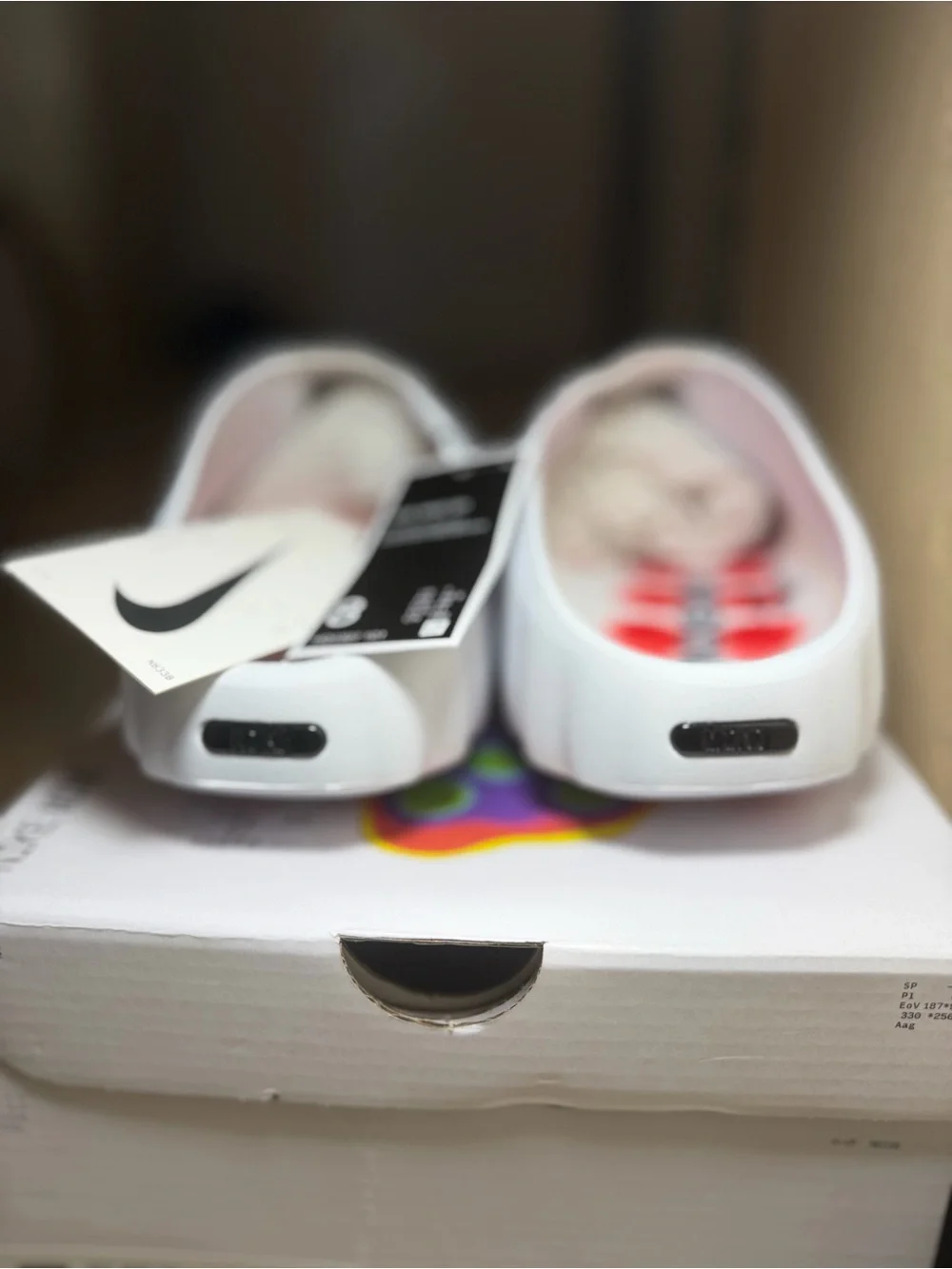 Nike Kids White Slip-On Slide with Black Swoosh Accent